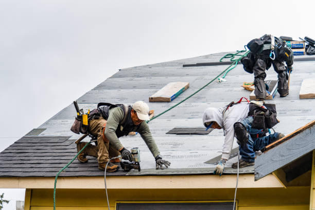 Professional Gutter Installation technician working in Greenfield, MA